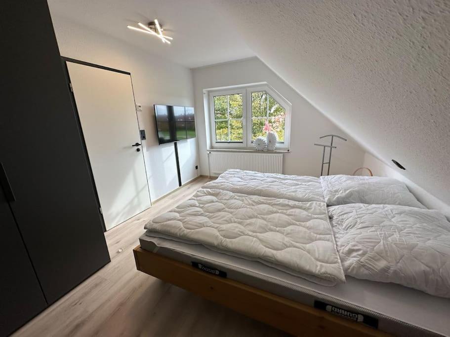 Haus Zuckersnuut Apartment Dornum Exterior photo